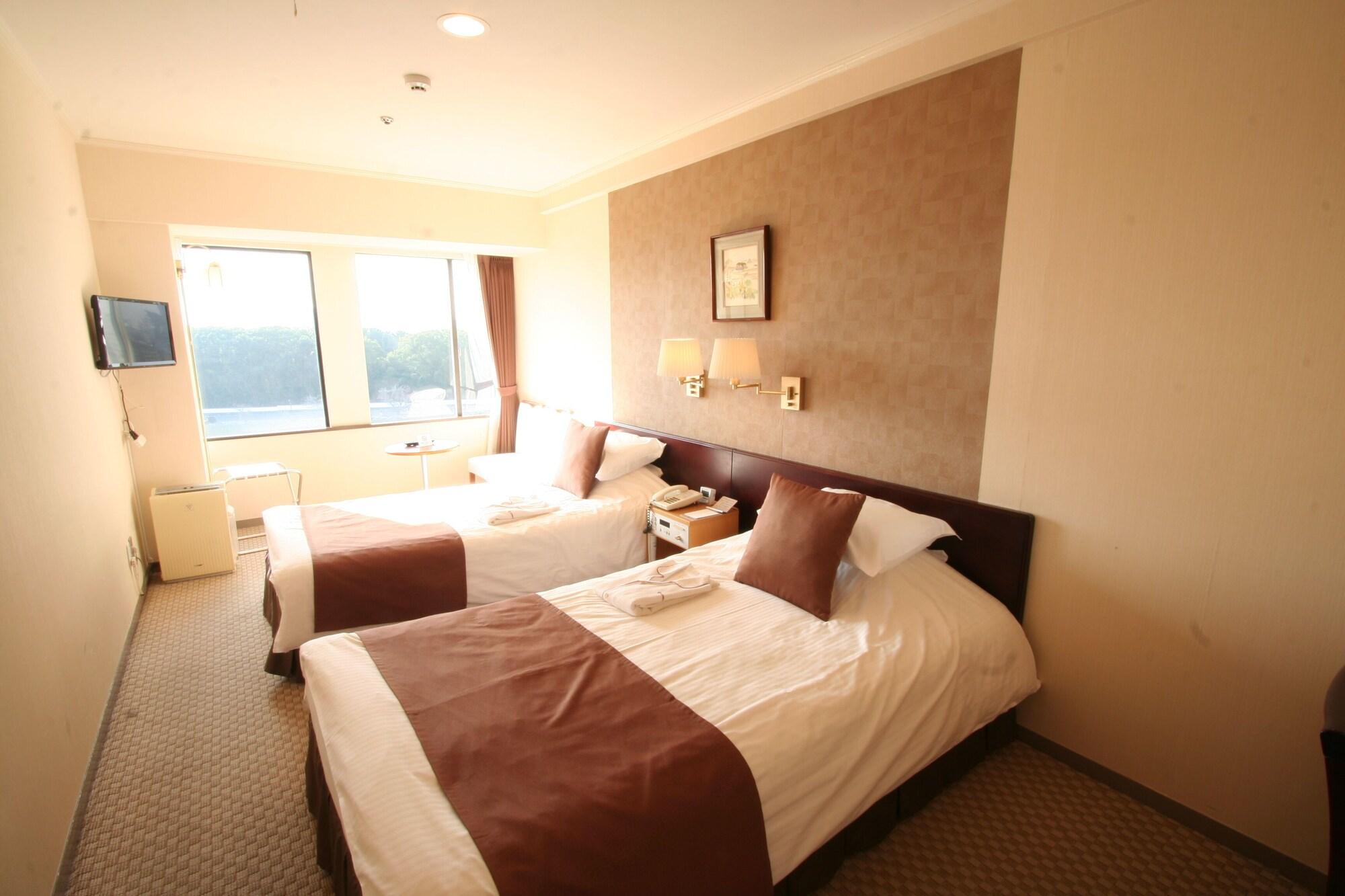Okayama Plaza Hotel Екстериор снимка